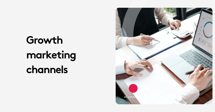 Two people discussing growth marketing channels with laptop and documents.