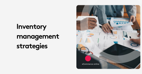 People reviewing charts and graphs during a meeting on inventory management strategies.