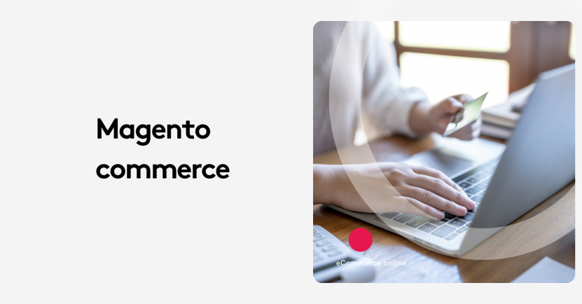 Person holding credit card using laptop for Magento commerce.