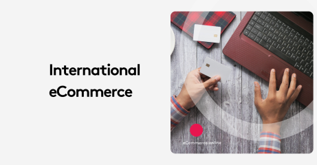 Person using a laptop and holding a credit card, with 'International eCommerce' text.