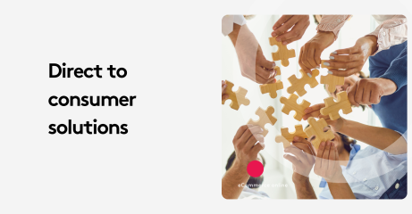 Team holding puzzle pieces symbolizing collaboration and direct to consumer solutions