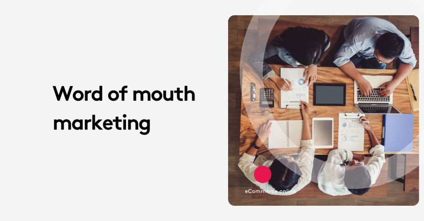 Top view of a team meeting with laptops and documents on word of mouth marketing.