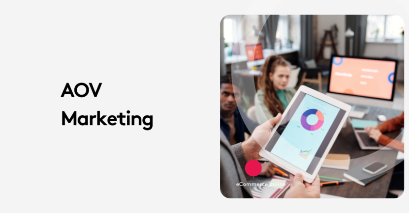 Tablet showing analytics in marketing meeting with team discussion.