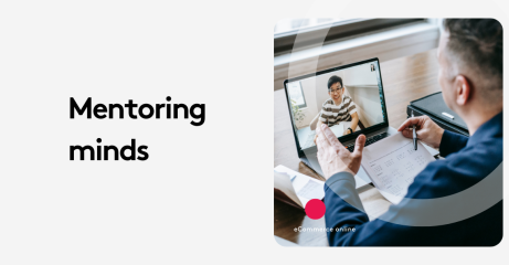 Two people in an online mentoring session using a laptop.