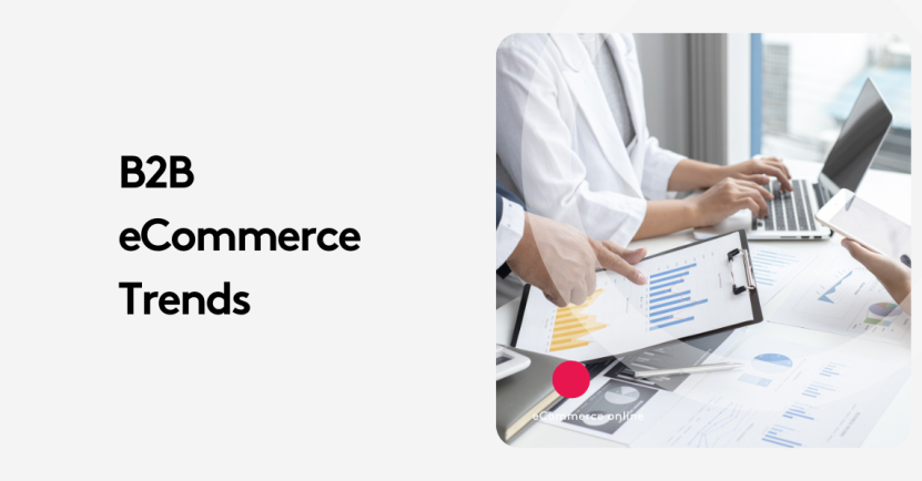 Business meeting discussing B2B eCommerce trends with charts and laptops.