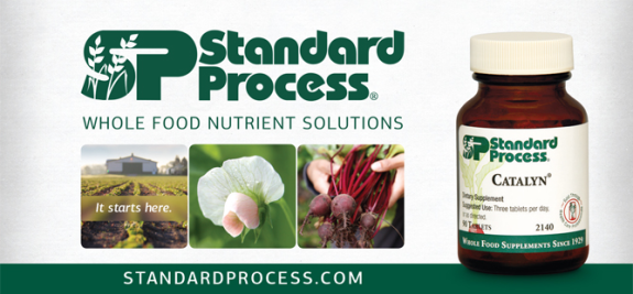 Standard Process supplement bottle with whole food nutrient images.