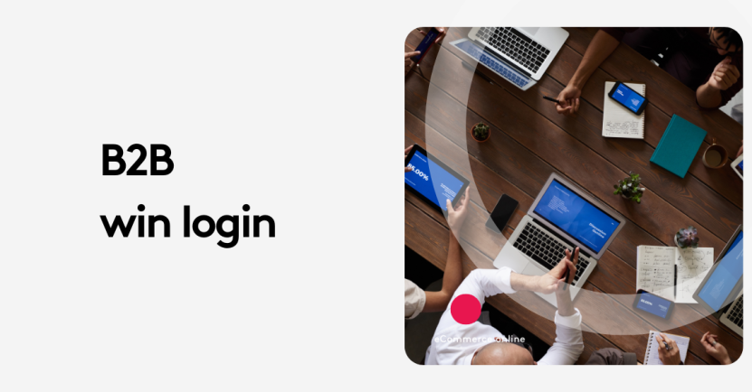 Top view of a business meeting with laptops, tablets, and notebooks on a wooden table.