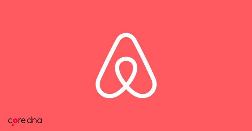 Airbnb logo on red background
