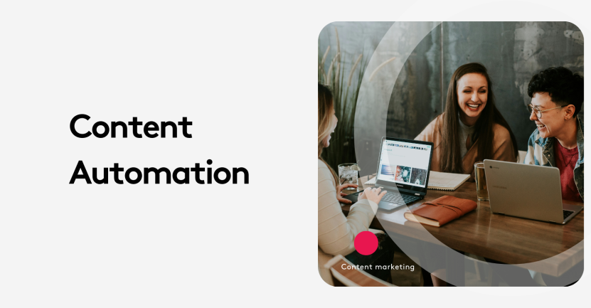 Group of people smiling and working on laptops in a meeting about content automation.