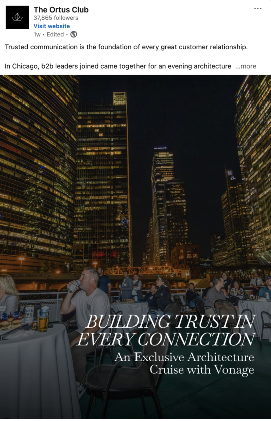 B2B leaders at a Chicago architecture cruise event with city skyline at night.