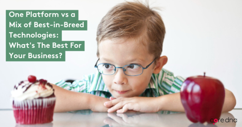 Boy in glasses deciding between a cupcake and an apple on a table.