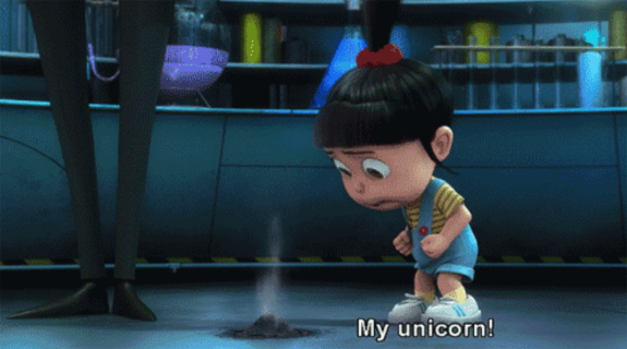 Animated girl looking sad at a small pile of ashes in a lab with caption 'My unicorn!'