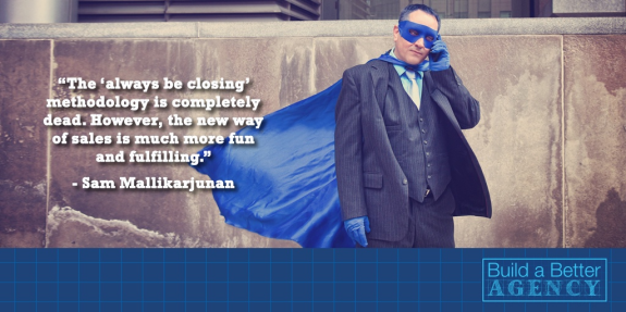 Businessman dressed as superhero with blue cape and mask next to sales quote.
