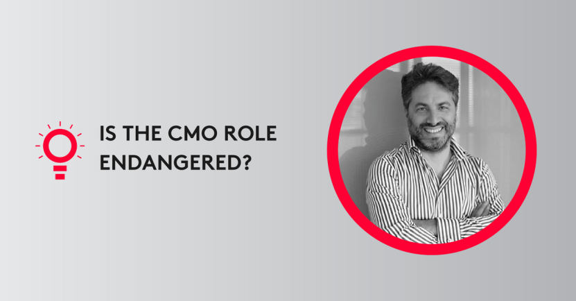 Portrait of a smiling man in a striped shirt with text 'Is the CMO role endangered?' on a gray background.
