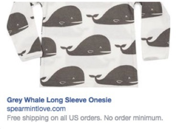 Grey whale patterned long sleeve onesie for infants.