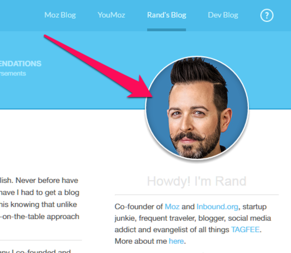 Profile picture of a blog author with a mustache on a blue background.