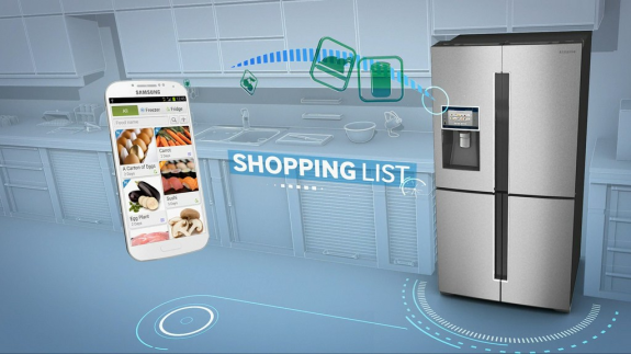 Smart fridge and smartphone displaying a shopping list app in a modern kitchen