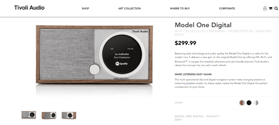 Tivoli Audio Model One Digital radio with walnut and grey design, featuring FM and Bluetooth connectivity.