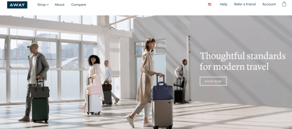 Travelers in airport with stylish luggage, promoting modern travel standards.