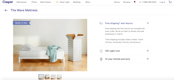 Casper Wave mattress in a room with a box and teal blanket on bed.