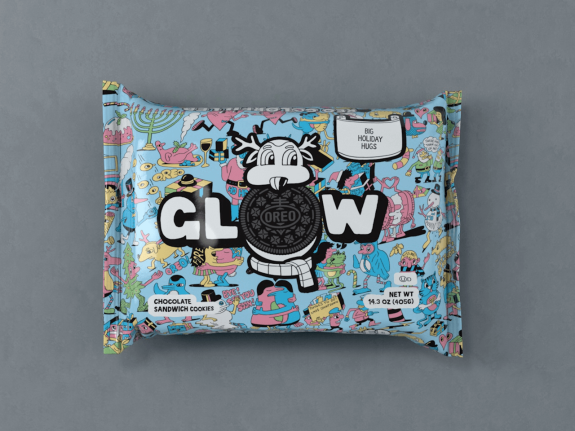 Oreo Glow holiday packaging with colorful design on gray background.