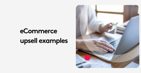 Person holding credit card and typing on laptop for ecommerce upsell examples.