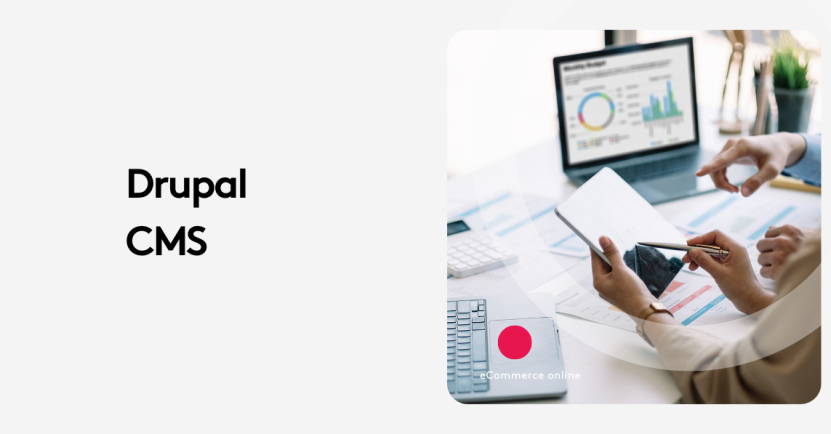 People using a tablet and laptop with analytics graphs in a Drupal CMS meeting