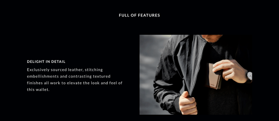 Man holding brown leather wallet inside black jacket