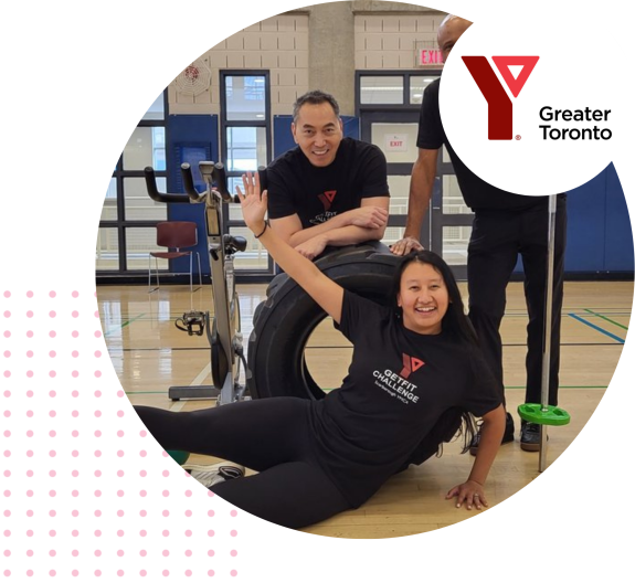 Group posing in a gym with YMCA Greater Toronto logo