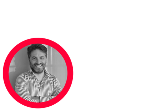 Smiling man in a striped shirt with a red circle border.